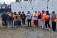 PERAYAAN - Semarak HUT RI ke-81 diisi dengan berbagai perlombaan yang mempererat kebersamaan. Pegawai dan peserta tampak kompak membawa balon dalam suasana penuh keceriaan.