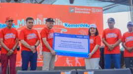 EKONOMI - Regional CEO BRI Region 16 Manado Elizabeth Primasari bersama Wakil Gubernur Maluku Utara Sarbin Sehe menghadiri Semarak Desa BRILiaN di Desa Balbar, Sofifi, Sabtu (22/8/2026). (Dok: Istimewa).